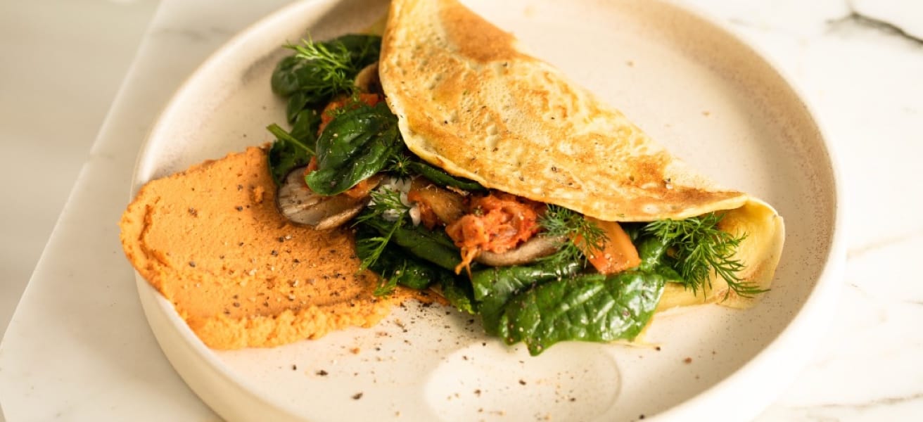 Omelette on a plate with garnish